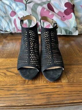 Unisa Black Perforated Peep-Toe Ankle Strap Heels